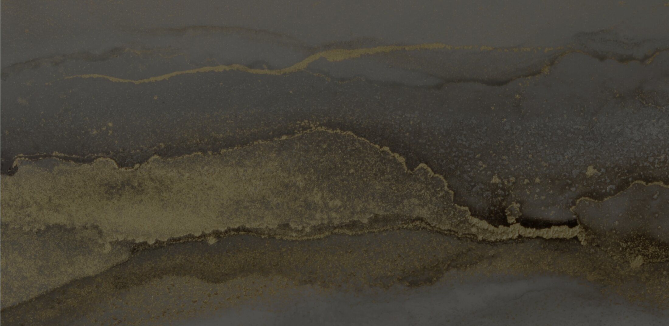 Abstract gray and gold textured background.